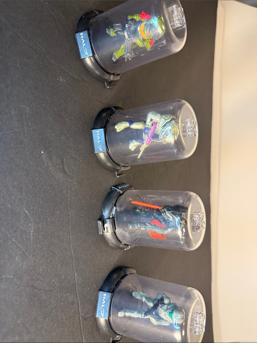 Halo Mini Figure Capsules with Blue, Green, Purple and Orange Figures